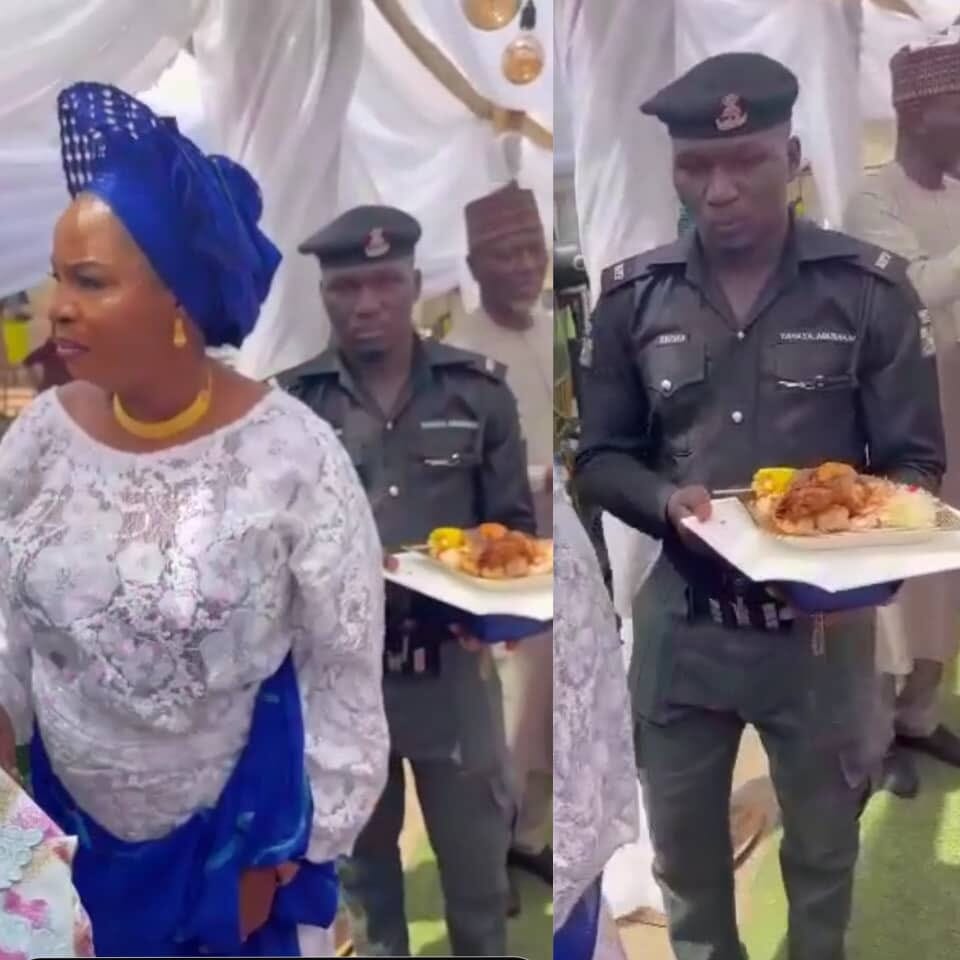 Nigerian Police officer spotted in a video holding a plate of food for her boss lady, Nigerian Police officer spotted in a video holding a plate of food for her boss lady, INFINITY LOADED