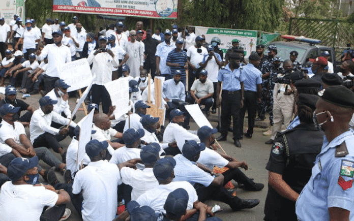 Protesting Workers Disrupt Activities at National Assembly over unpaid salaries, Protesting Workers Disrupt Activities at National Assembly over unpaid salaries, INFINITY LOADED